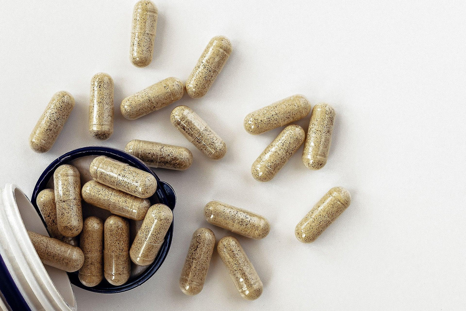 Overhead closeup of herbal capsule supplements