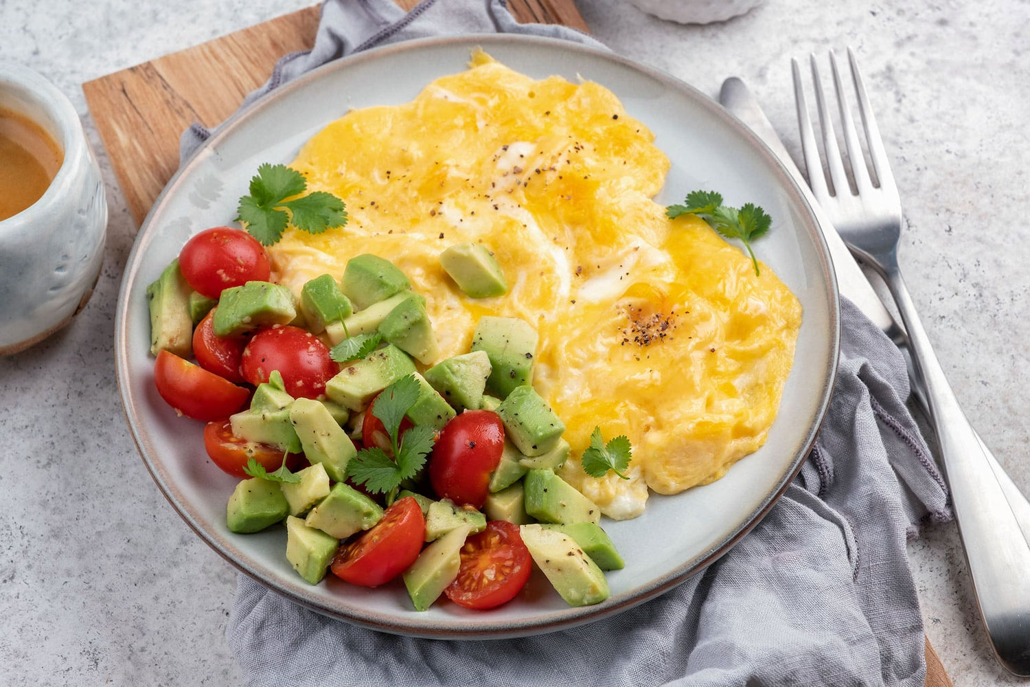 Naturally gluten-free meal with eggs, avocado, and vegetables for athletes