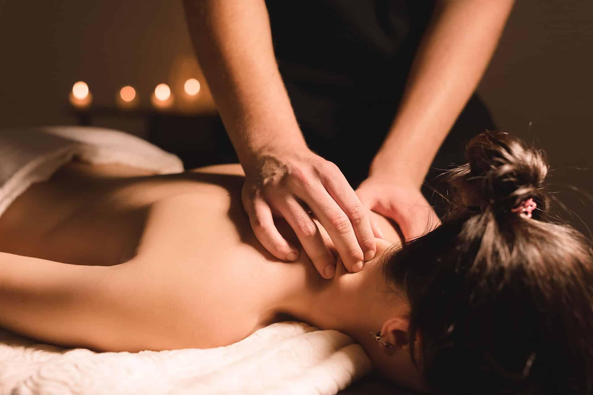 Female receiving back and neck massage