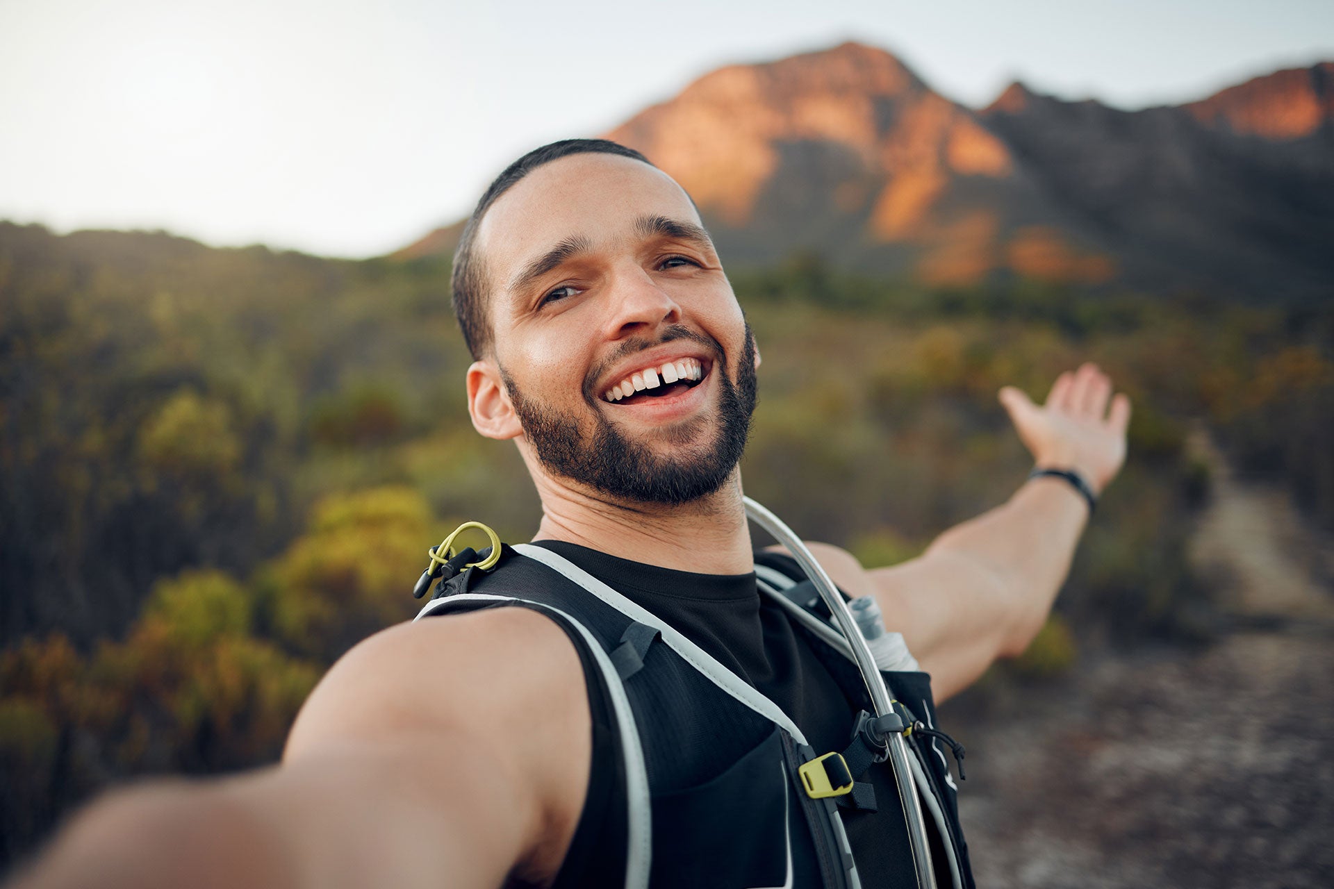 Fit male backpacking in mountains